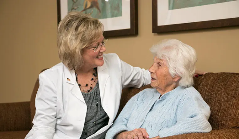 nurse and patient looking at each other
