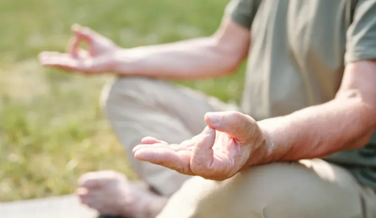 senior doing yoga